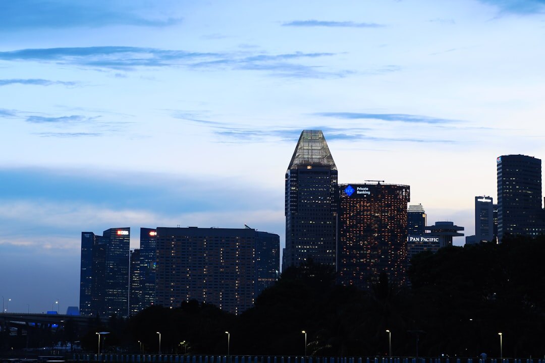 City skyline at dusk with illuminated buildings
